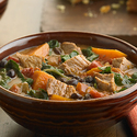 Pork, Sweet Potato And Black Bean Stew with Fresh Greens